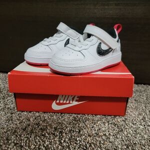 Nike Kids White Sneakers with Black and Red Accents